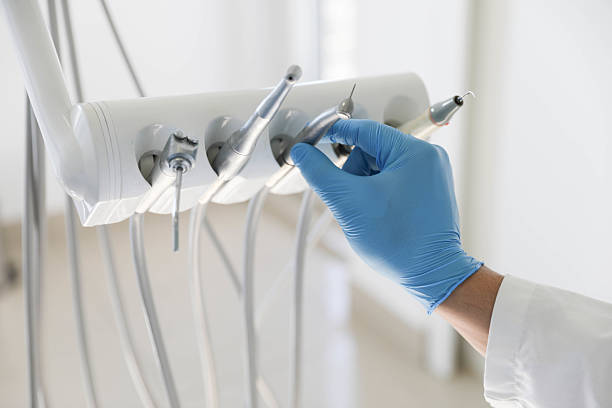 Professional Tooth Extraction technician working in White Bear Lake, MN